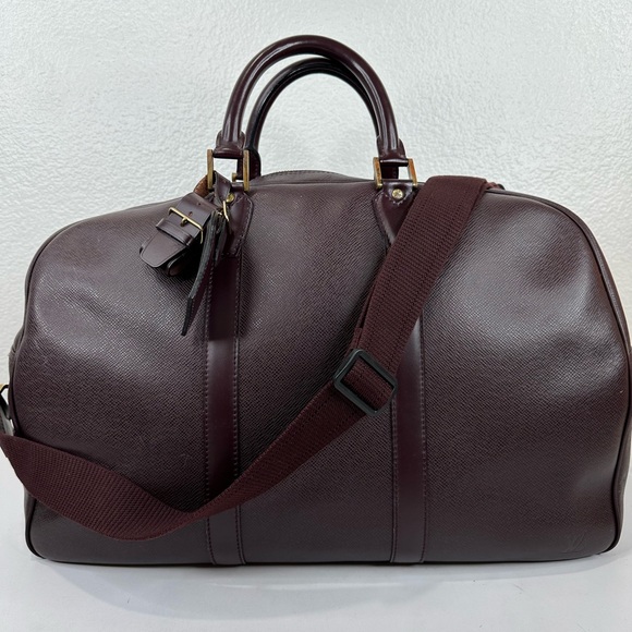 LV38 LOUIS VUITTON Taiga travel bag with strap - Picture 1 of 14